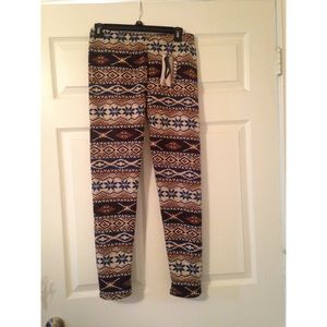 BRAND NEW fleeced lined patterned leggings.