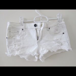 White cutoff denim shorts