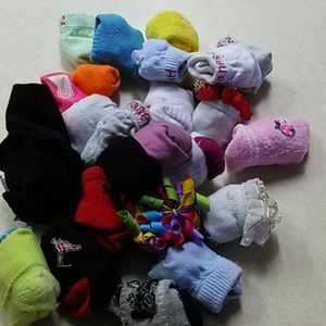 23 pairs of baby socks