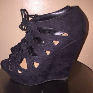 Black Charlotte Russe wedges . Size 7 . Worn once