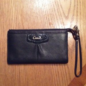 NWOT...Authentic Black Coach wristlet!