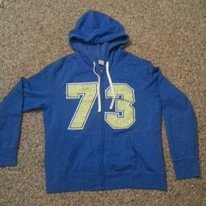 Adorable blue zip up hoodie with lime green!