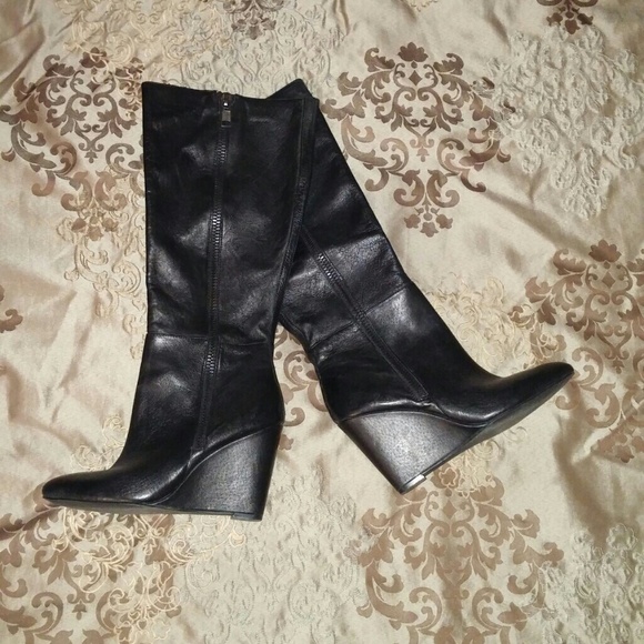 Black leather Steve Madden wedge boots