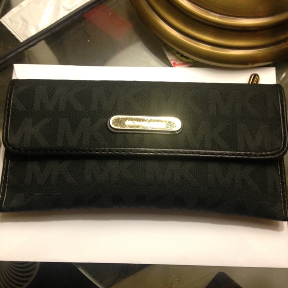 Black Michael Kors flap wallet