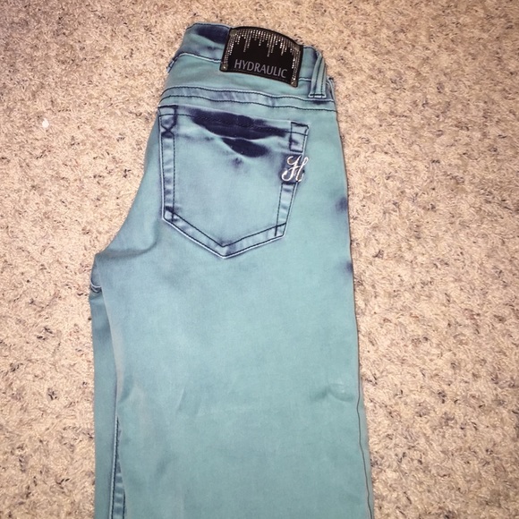 Hydraulic teal jeans