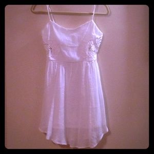 White summer dress with flower cut outs