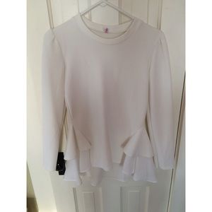 Long sleeve peplum top with chiffon accents