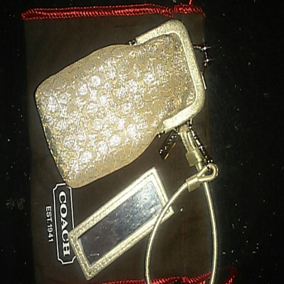 Small COACH makeup wrislet.