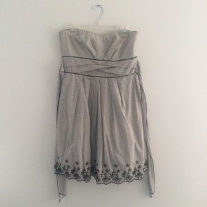 Black, grey, and white strapless dress