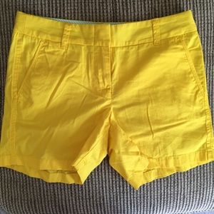 J. Crew broken in chino short in bright yellow.
