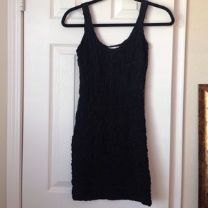 Adorable tight little black dress!