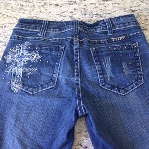 Dark wash Cowgirl Tuff Co jeans