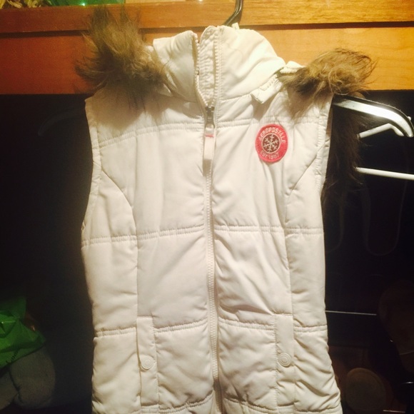 White &a pink vest