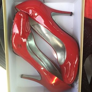 Jessica Simpson red high heels