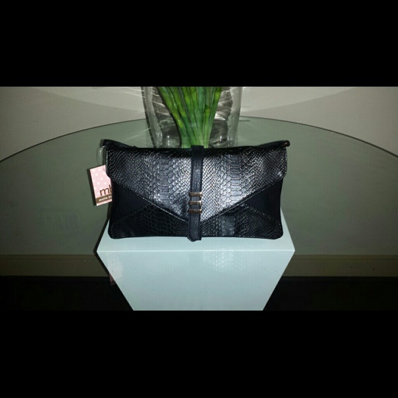 Melie Bianco Handbags - Melie Bianco black Clutch