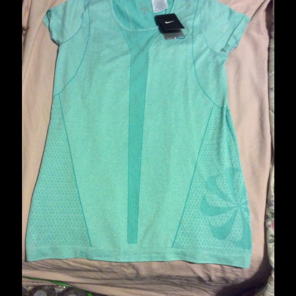 Brand new w/Tags Nike dri-fit L shirt