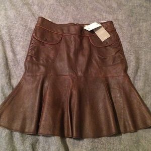 Anthropologie via June brown leather skirt