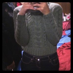 Green knitted sweater