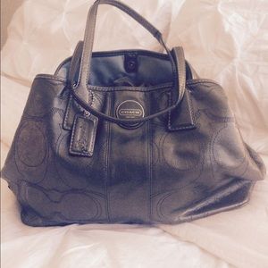 Gray metallic Coach purse