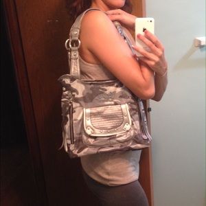 Kathy Van Zeeland camo bag & sleeveless sweater