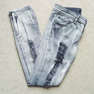 Gray torn distressed acid wash skinny jeans