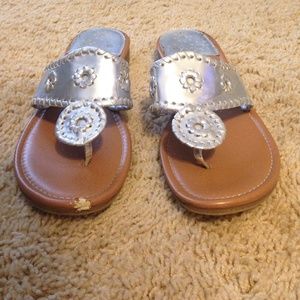 Silver palm sandals.