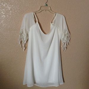 White, off the shoulder dress. So gorgeous !