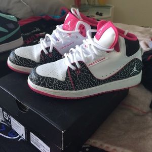 Pink black and white Jordan's