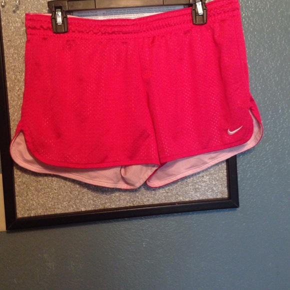 Pink nike running shorts