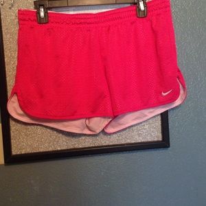 Pink nike running shorts