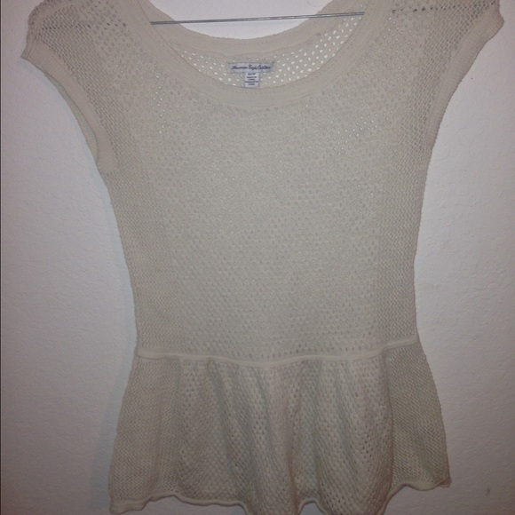 Knitted white peplum shirt