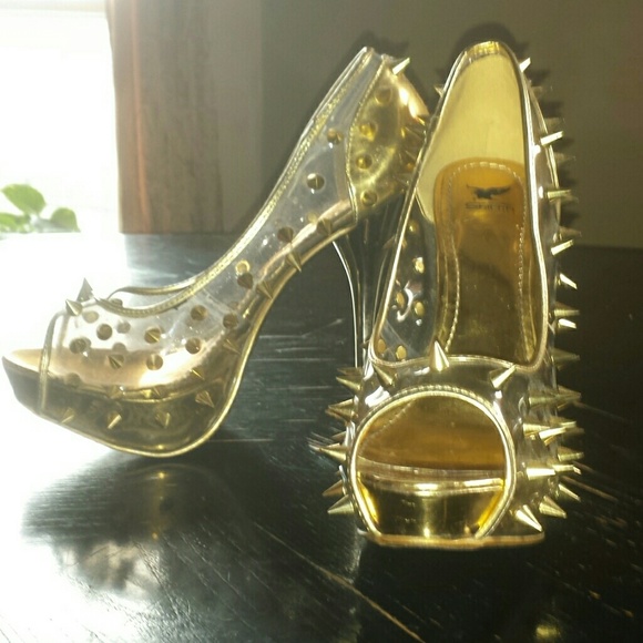Gold spiked heels