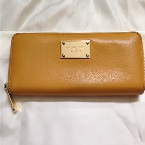 Michael Kors soft leather yellow zip around wallet