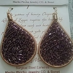 Purple dangling earrings