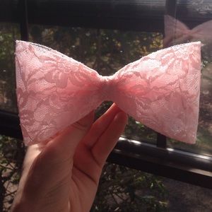a light pink lace bow