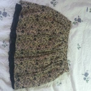 Tan and black floral skirts