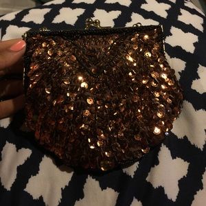 Clutch with black beaded trim. Clutch with black beaded trim.