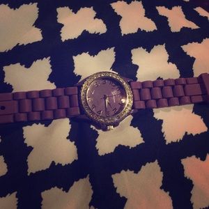 Purple rhinestoned watch.