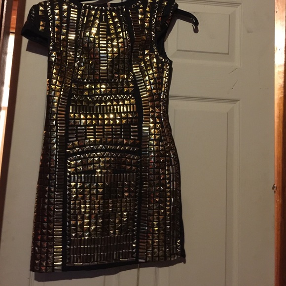 Gold and black homecoming or prom dress.