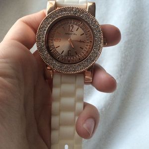 Rose gold and white watch