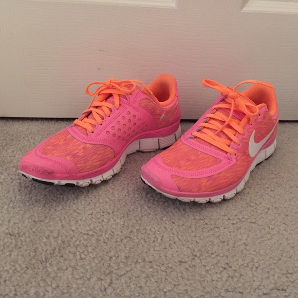 Pink and orange Nike free 5.0 v4(women's size 9)
