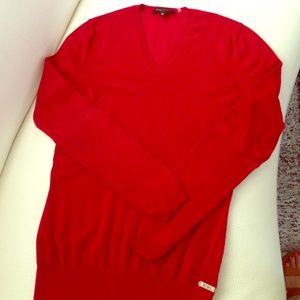 Red color sweater