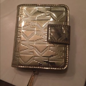 Gold metallic michael kore wallet