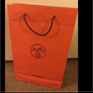 Hermes shopping bag.