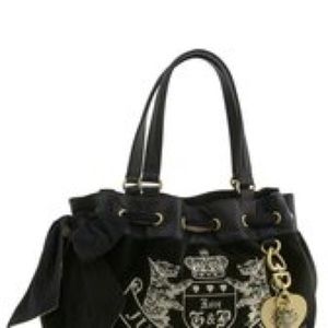 Juicy Couture Handbag. Very light wear and tear.