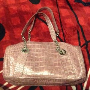 Nine West pink snake round design