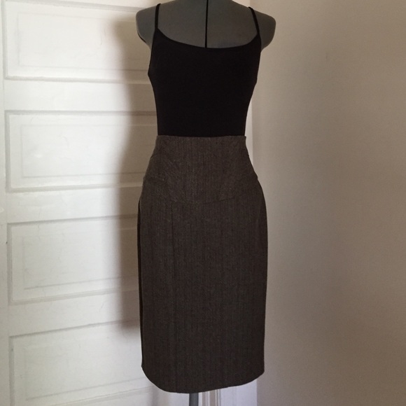 Tweed pencil skirt, brown, flare at back hem.