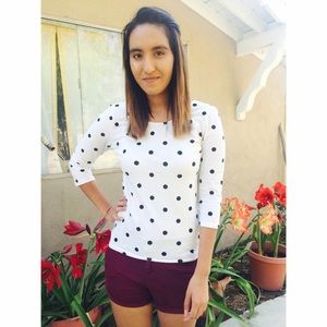 White & black polkadot shirt