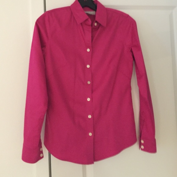 Bright pink button down shirt.