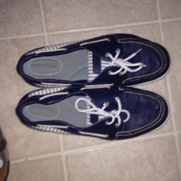 Navy blue and white Sperrys